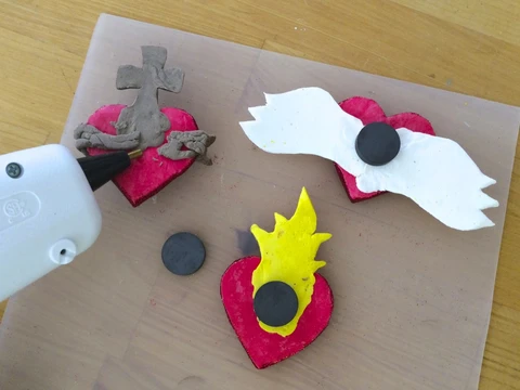 Learn to make a sacred heart magnet set with air dry clay.